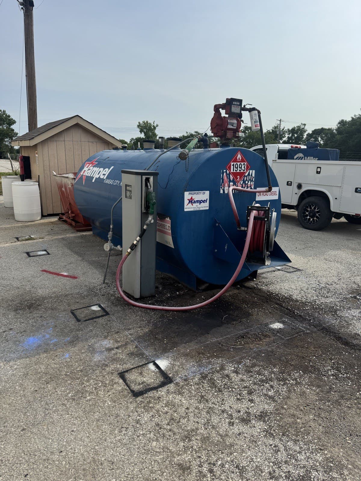 Commercial fuel tank secured with protective steel bollards
