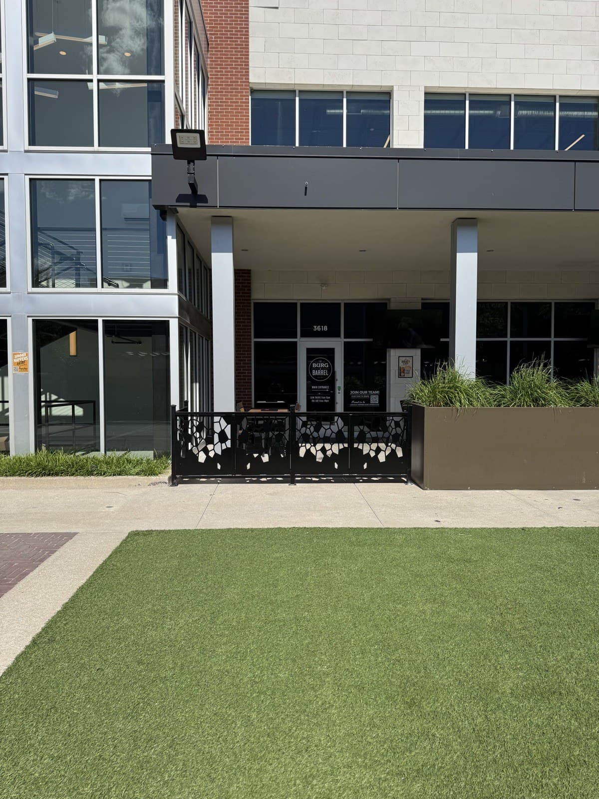 Custom patio railing with ornamental cut-metal panels